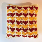 Coussin au crochet en motif cœurs Fleurétoilée