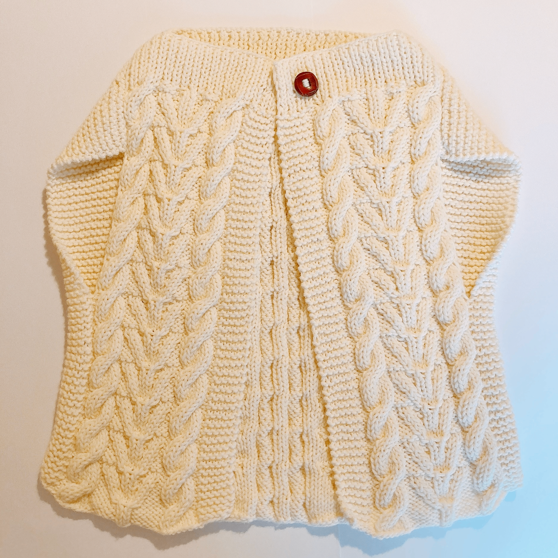Veste sans manches en tricot Fleurétoilée