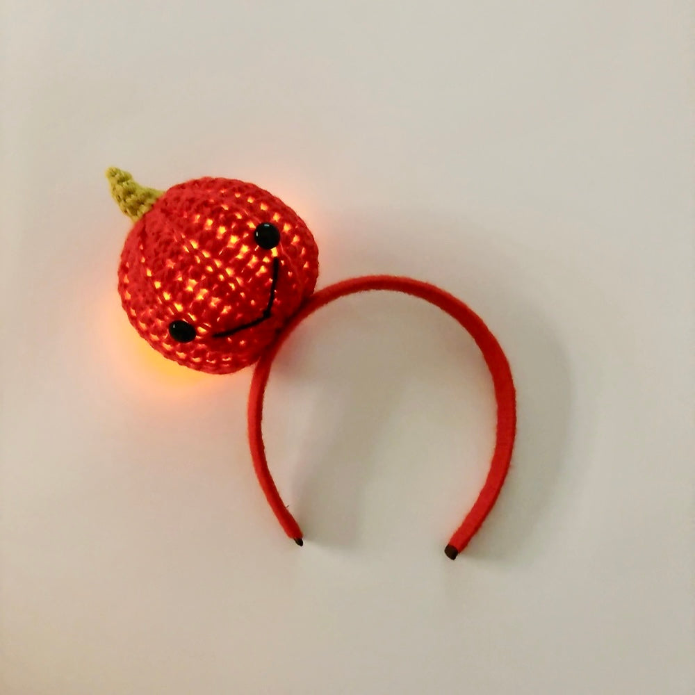 Leuchtendes Häkelstirnband „Smiling Pumpkin“