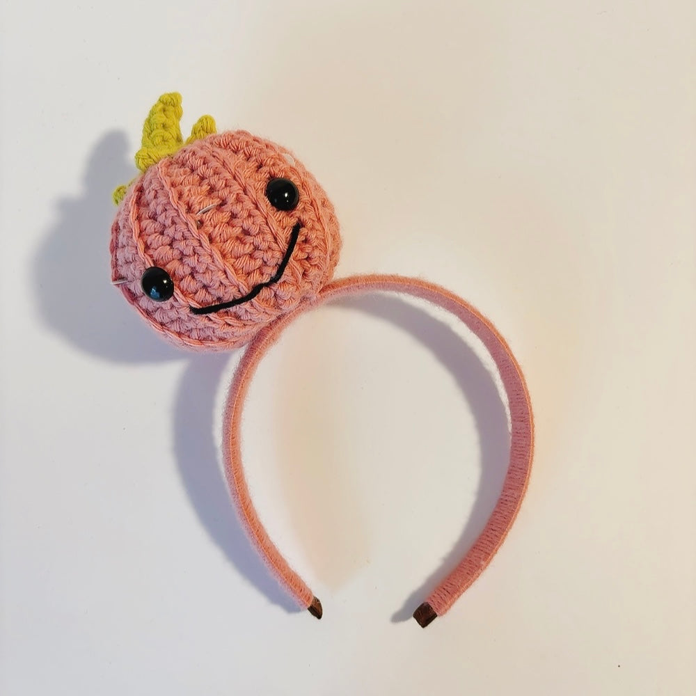 Leuchtendes Häkelstirnband „Smiling Pumpkin“