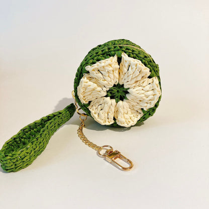 Mini-Mini porte-monnaie à fleur en crochet.