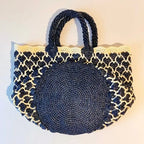 Sac à main (Bucket) Raphia en motif cœur.