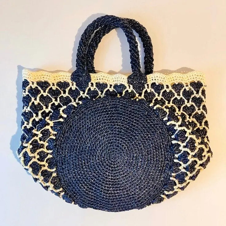 Sac à main (Bucket) Raphia en motif cœur.