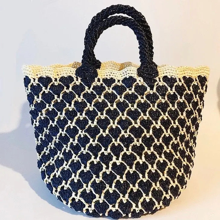 Sac à main (Bucket) Raphia en motif cœur.